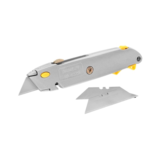 STANLEY 0-10-499 silver utility knife with yellow button, two extra blades, side angle on white background.