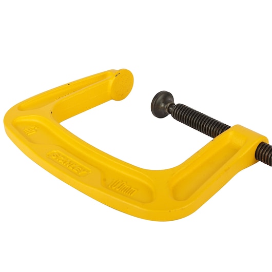 Photo of STANLEY 0-83-034 C-clamp with yellow frame and black screw, product photography on white background.
