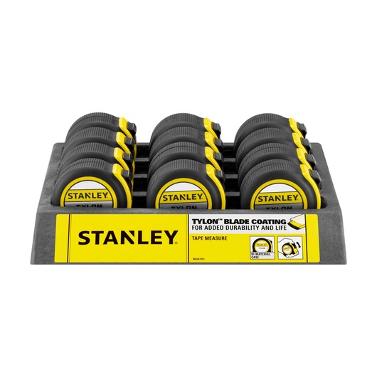 Photo of STANLEY 1-30-656 tape measures with yellow and black casing, displayed in a tray from the front.