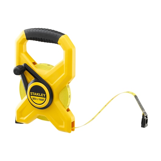 STANLEY 34-791 yellow open reel tape measure, 30m/100ft, front angle on white background.