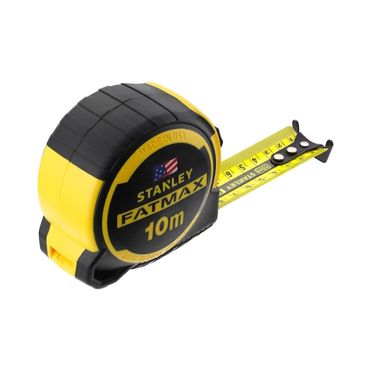 Stanley FatMax 10m tape measure with yellow and black casing and extended yellow measuring tape.