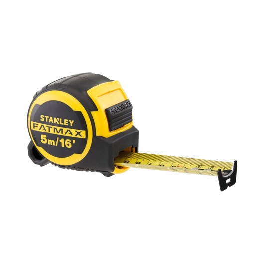 Stanley FATMAX tape measure with yellow casing and extended blade showing metric and imperial units.