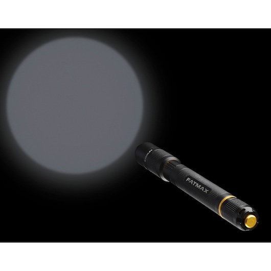 STANLEY FMHT81510-0 flashlight projecting bright white beam, black and yellow body, angled view.