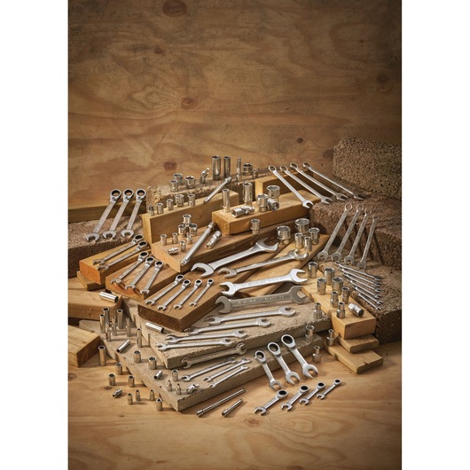 STANLEY FMMT13037-0 photography of assorted wrenches and sockets displayed on wood blocks.
