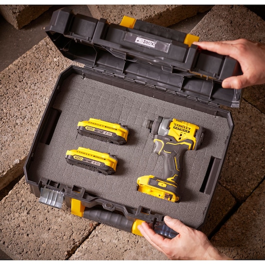 STANLEY FMST1-71966 photography of tool case with impact driver and two batteries, top view