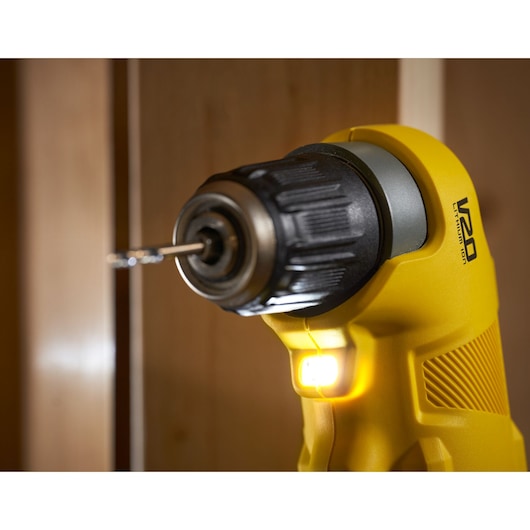 STANLEY SFMCD750B cordless drill close-up, yellow body, V20 Lithium Ion, LED light, side angle.