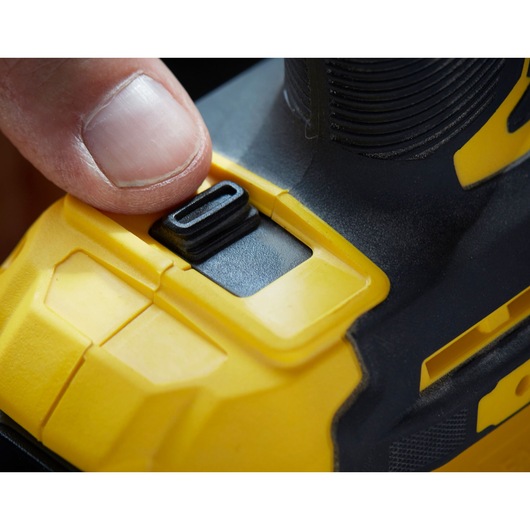 STANLEY SFMCF820D2K close-up photo of side switch on yellow and black power tool body.