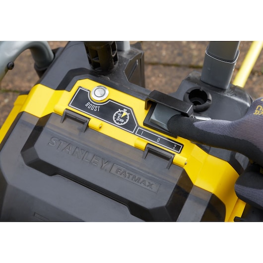 Photo of STANLEY SFMCPW1500B pressure washer control panel with boost button and selector dial.