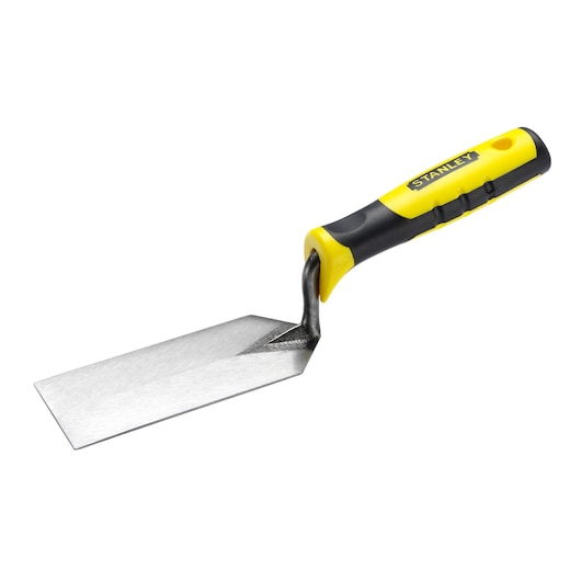 Stanley brick trowel with yellow and black ergonomic handle and flat steel blade for masonry tasks.