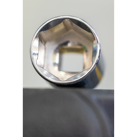STANLEY STMT82666-0 chrome socket close-up, showing hexagonal opening, top view, white background.