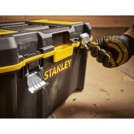 STANLEY STST83397-1 black and yellow toolbox with metal latches, worker opening front latch.