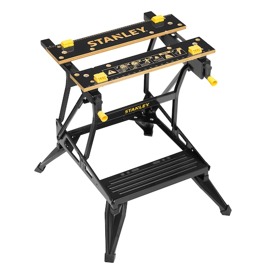 STANLEY STST83400-1 black and yellow workbench with folding frame and adjustable clamps, front angle.