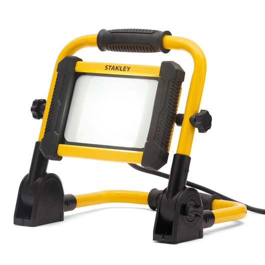 Stanley portable LED work light with yellow frame and black base, designed for photography and studio use.