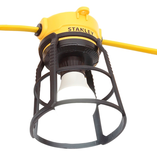 Stanley work light with protective cage, yellow and black, suitable for photography and industrial use.