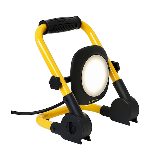 Photo of STANLEY SXLS35525E portable yellow and black LED work light with handle, front angle view.