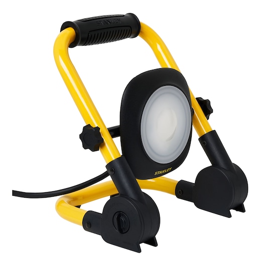 STANLEY SXLS35525E portable LED work light with yellow frame, black accents, and handle, angled front view.