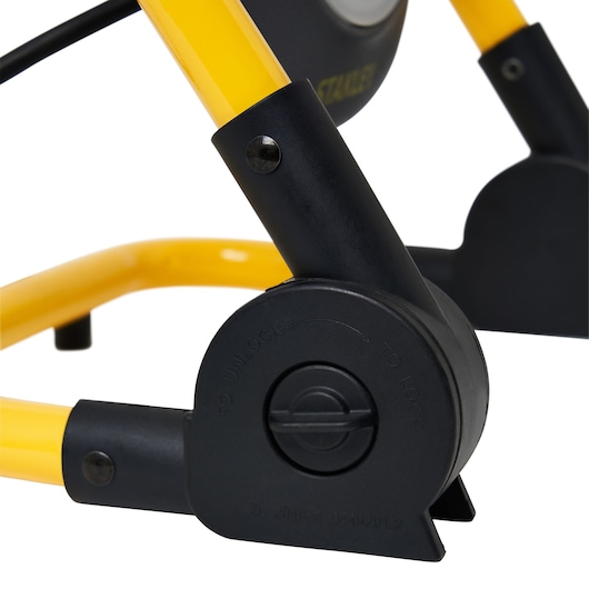 STANLEY SXLS35526E photography of yellow and black adjustable joint on tool stand, side angle.