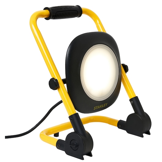 STANLEY SXLS35527E work light with yellow frame, black handle, and circular LED panel, front angle, white background.