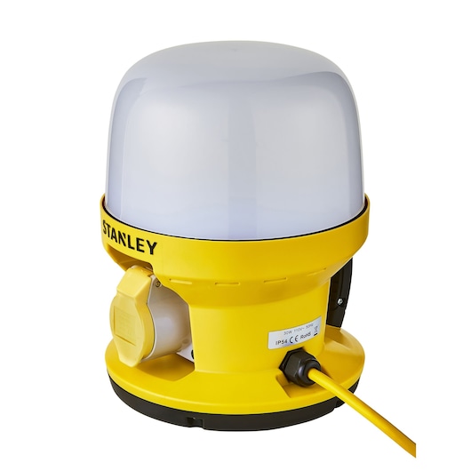 STANLEY SXLS36986E work site LED lamp with yellow base, white dome, and power cord, front angle.