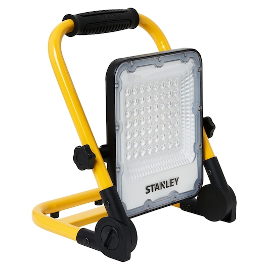 STANLEY SXLS37177E portable LED work light with yellow frame, front angle on white background.