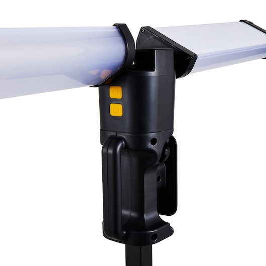 STANLEY SXLS37182E LED work light, close-up side angle, black body, two yellow power buttons, white diffusers.