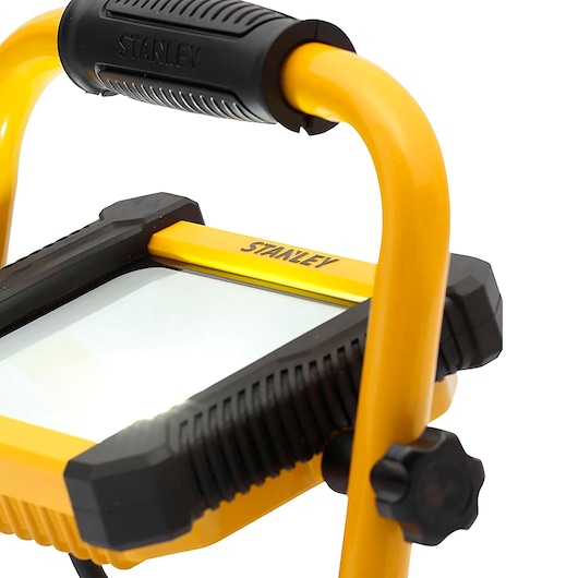 STANLEY SXLS41219E portable LED work light, yellow and black frame, close-up angle.