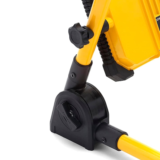 STANLEY SXLS41219E photography, close-up of adjustable yellow and black tripod joint on white background.