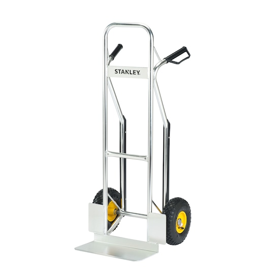 Stanley metal hand truck with two wheels and handle grips for transporting heavy items.