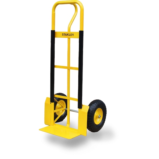Yellow and black Stanley hand truck with two large wheels, designed for moving heavy items, on a white background.