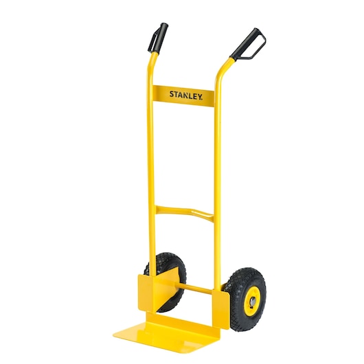 Yellow STANLEY hand truck with black handles and two wheels, designed for transporting heavy items.