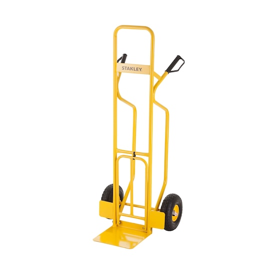 Yellow STANLEY hand truck with two black wheels and handles, designed for moving heavy items easily.